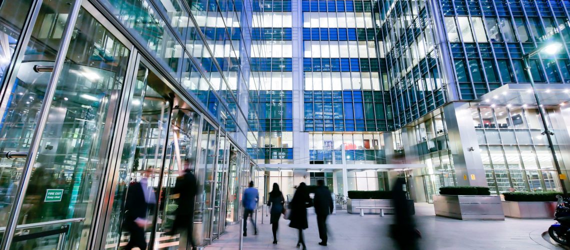 London train and office building skyscraper in rush hour