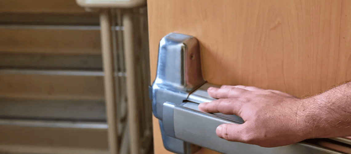 man-opening-fire-door